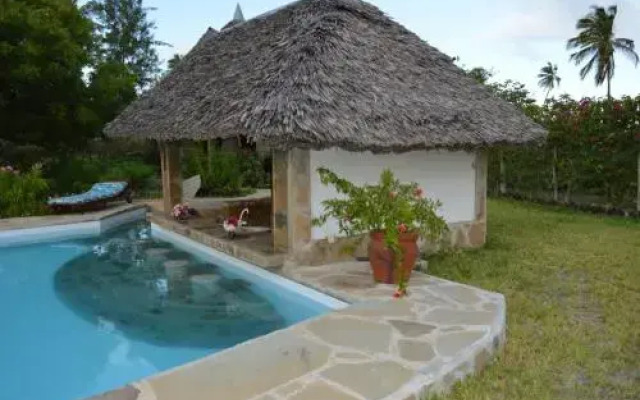 Coast Sun Gardens Cottage