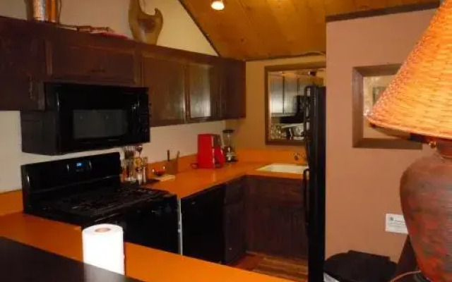 Two-Bedroom plus Den Deluxe Unit #124 by Escape For All Seasons