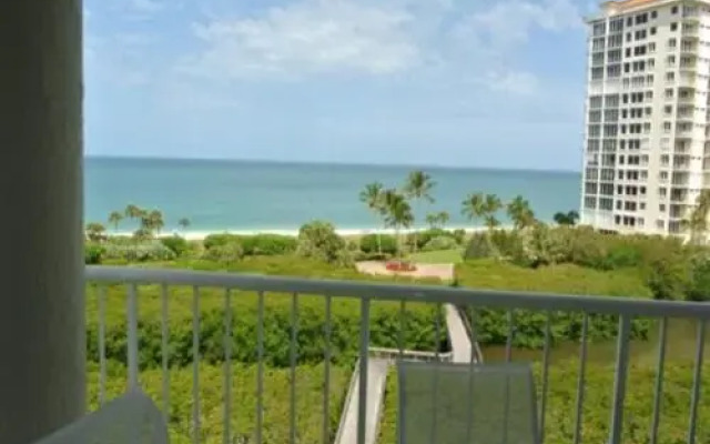 Deluxe Beachfront Condo Located in Prestigious Resort with Pool and Hot Tub by RedAwning
