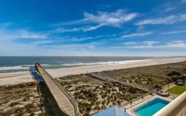 Oceanfront Condo with Beach Access, Pool, and Tennis Court by RedAwning