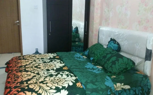 Rose Rooms @ Apartemen Margonda Residence by ZUZU