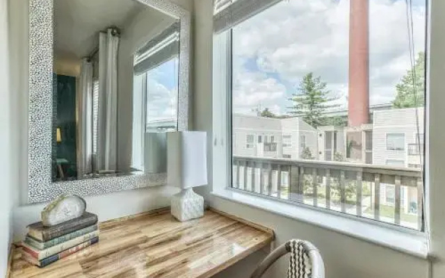 Riverside Condo Near Downtown by RedAwning