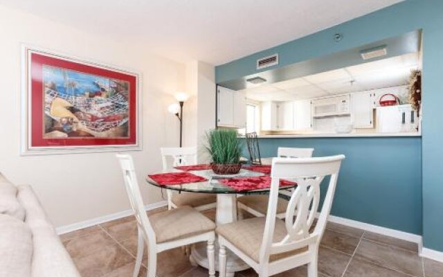 Gulfside 203:WRAP AROUND BALCONY, GORGEOUS UPGRADES - FLOORING AND FURNITURE!
