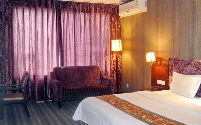 Shenzhen Junyi Mingdian Inn Xili