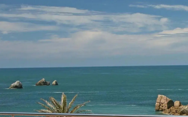 Apartamentos Playa de Portio