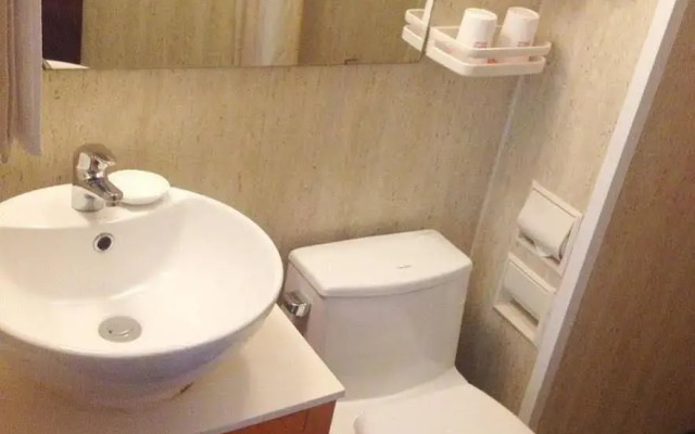 Izunco Inn Qingdao TV Mansion
