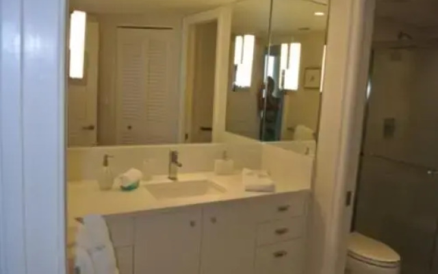Deluxe Beachfront Condo Located in Prestigious Resort with Pool and Hot Tub by RedAwning