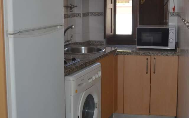 Reservaloen Puerta del Arenal / Topibe SL