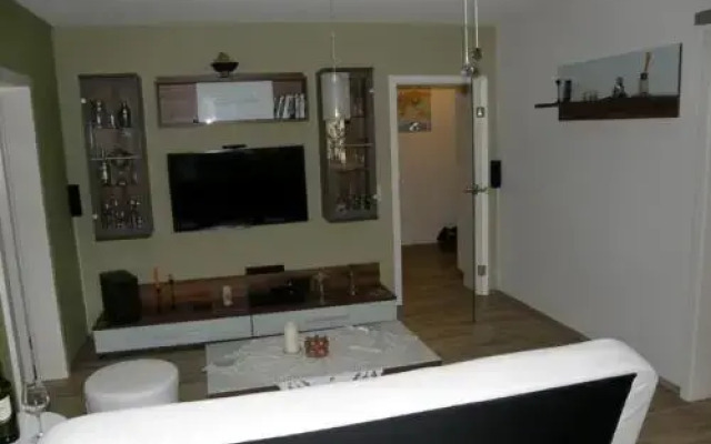 Das Schneckenhaus - Ferienwohnung mit Pool & Seeblick