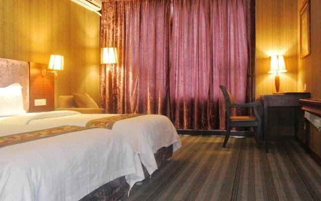 Shenzhen Junyi Mingdian Inn Xili