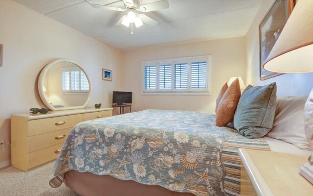 Coast View Condo Featuring Large Windows Overlooking the Beach by RedAwning