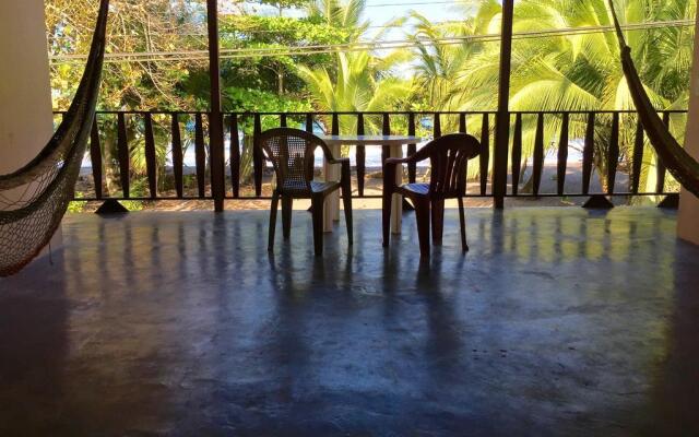 Paisajes del Tortuguero (On The Beach and Town Center)