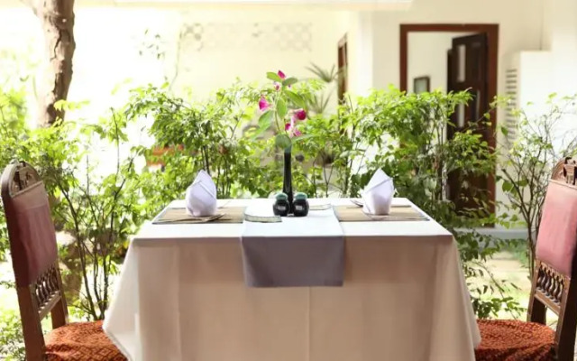 The Frangipani Green Garden Hotel and Spa