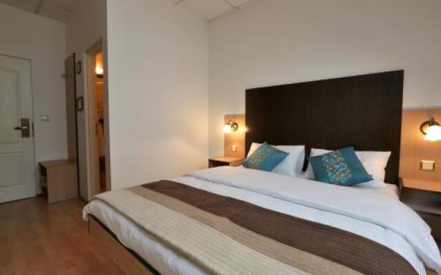 Times Inn Rooms and Apartments