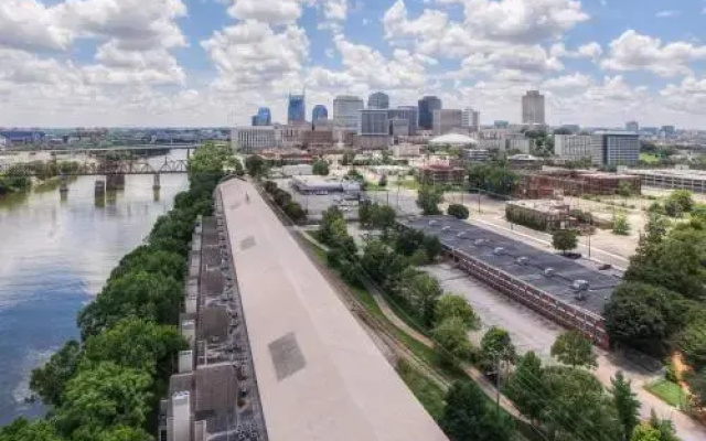 Riverside Condo Near Downtown by RedAwning