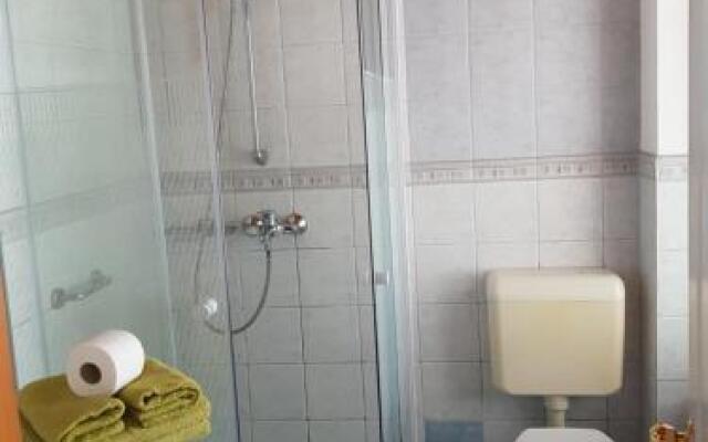 Négyévszak Apartmanház