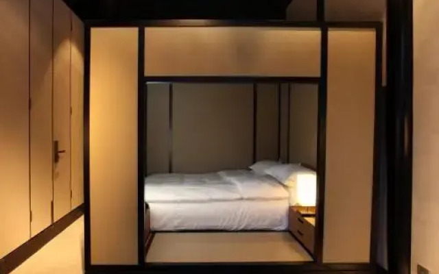 Yin Lv Tong Li Courtyart Hotel 