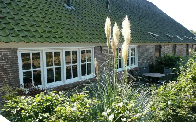 Het Koetshuis