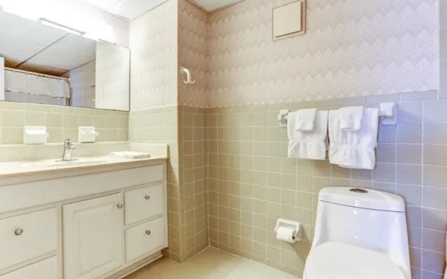 Convenience Direct Oceanfront Condo with Private Balcony by RedAwning