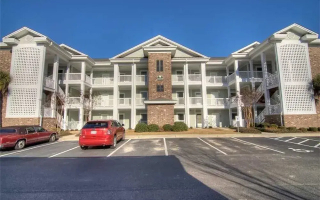 Magnolia Pointe 305-4889 Condo