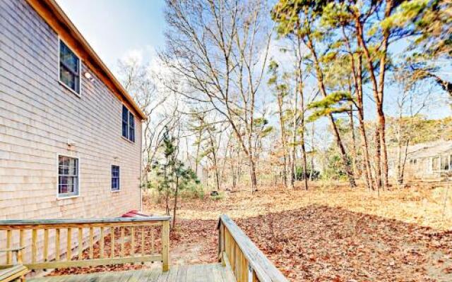 Woodsy Cape Cod Home by RedAwning