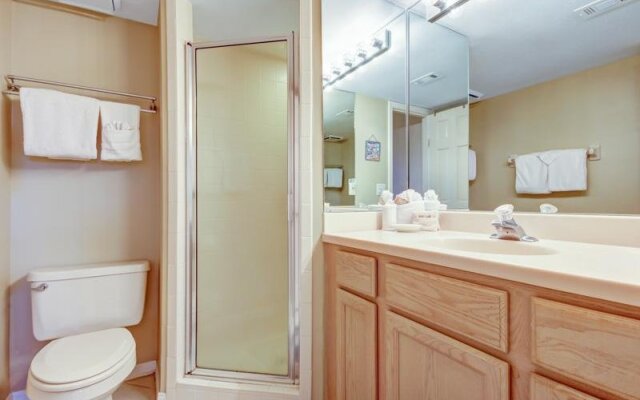 Coast View Condo Featuring Large Windows Overlooking the Beach by RedAwning