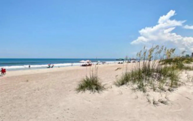 Brilliantly Decorated Condo for Your Perfect Beach Escape by RedAwning