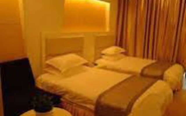 Отель Xinyi Holiday Hotel Puyan Road