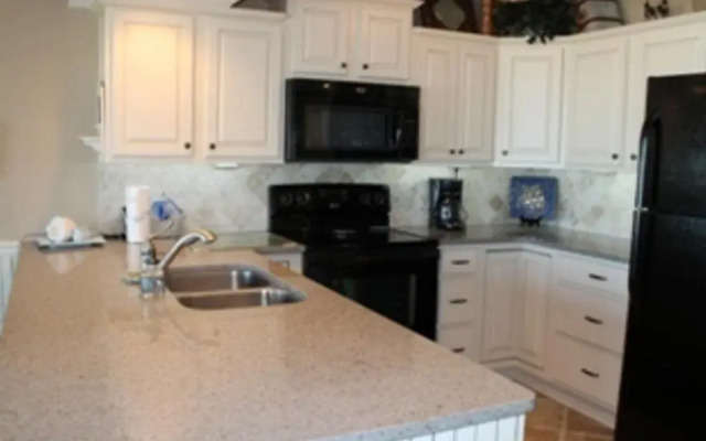 Coastline Condo with private Balcony to Enjoy Views of the Atlantic Ocean by RedAwning