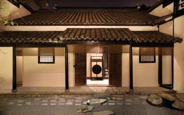 Yin Lv Tong Li Courtyart Hotel 