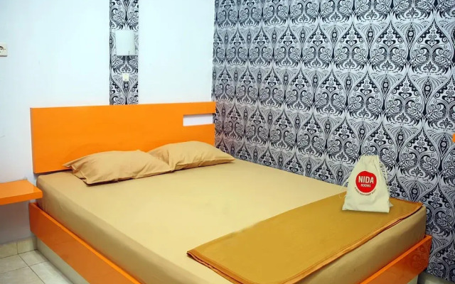 NIDA Rooms Gang Merpati Condong Catur