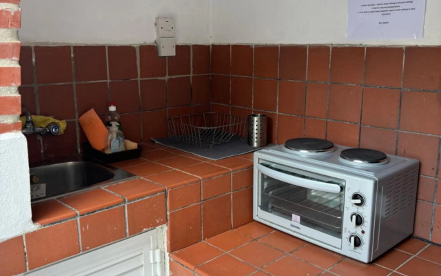 Mediterranean poolside garden cottage