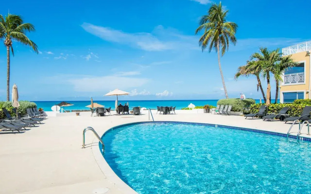 Regal Beach Club #122 by Cayman Vacation