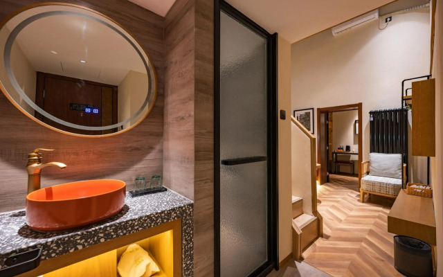 Qiuguo Hutong Courtyard Hotel