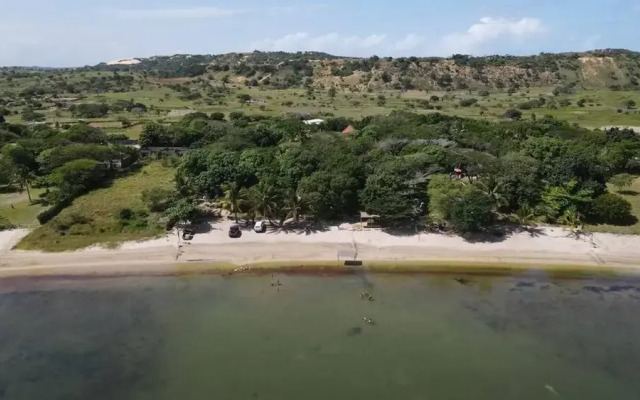 Log Cabin On And Overlooking a 9km Lagoon