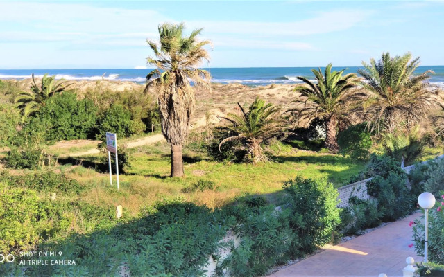 Residencial OlivalAcceso privado playa por jardín