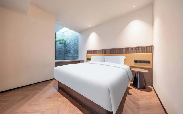 Yi Nian Fangcun Hotel