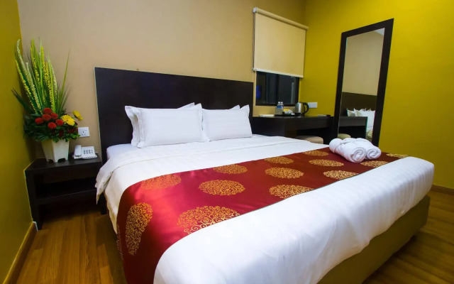 Capital O 91074 Grand World Hotel