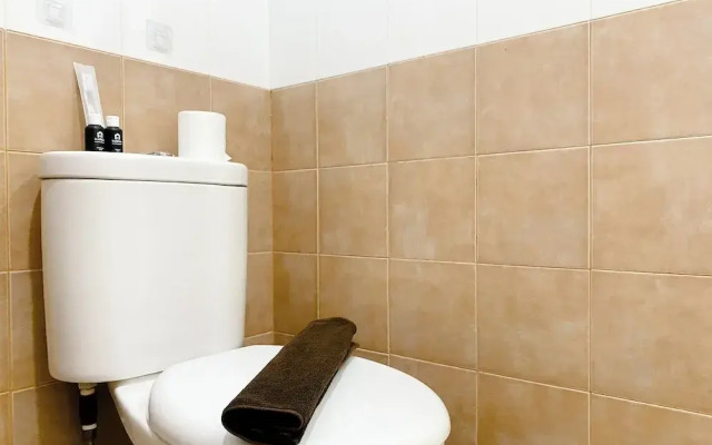 Comfort Designed 2Br Green Pramuka City Apartment