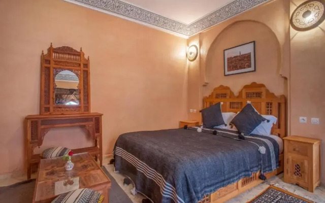 "room in Guest Room - Riad Lakouas Triple Room With Pool View"