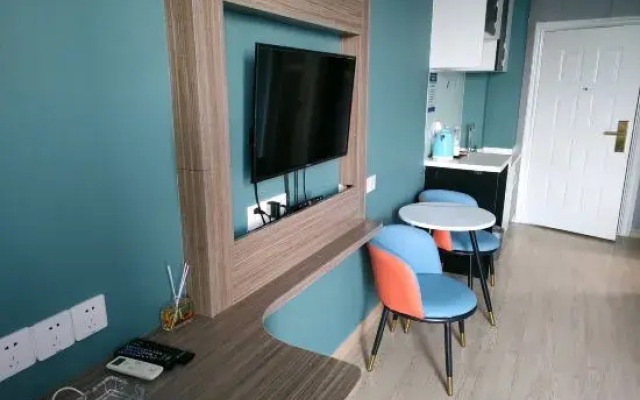Home Huayi Hotel (Pingdu Renmin Road Branch
