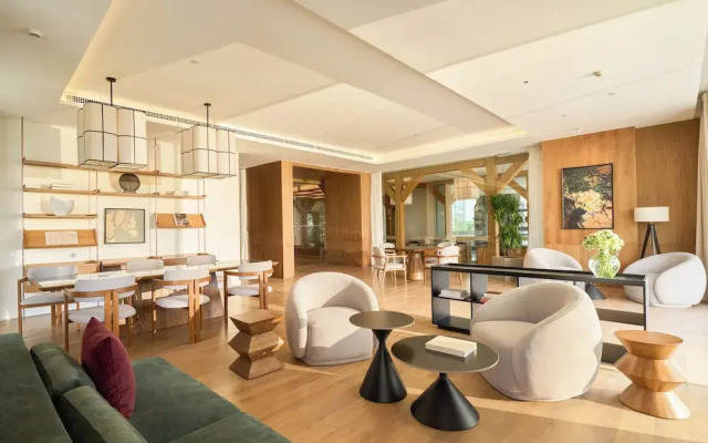 Signature By M Village Beachfront Hotel