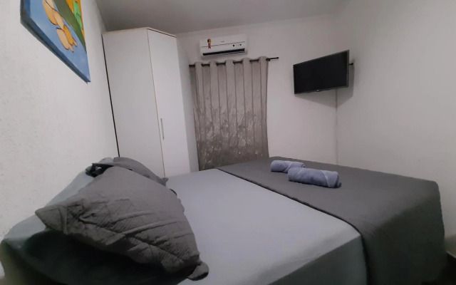 Apartamento Centro de Bertioga 100MTS da praia.