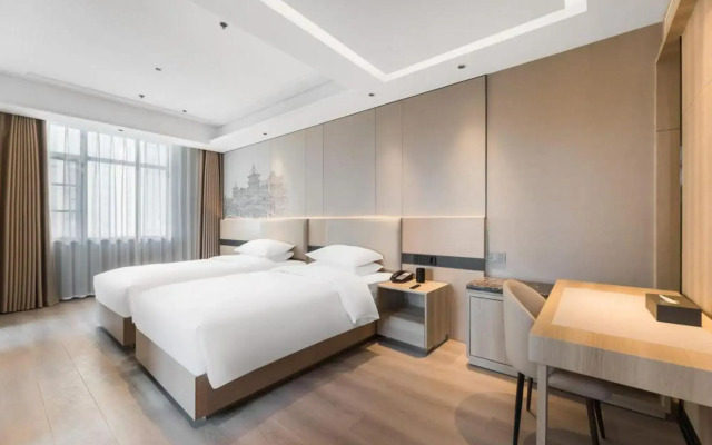 Xiangyang Langman City Hotel