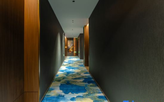 Mengdan International Hotel (Jiangmen Hetang Central Square Jinyi City Branch)