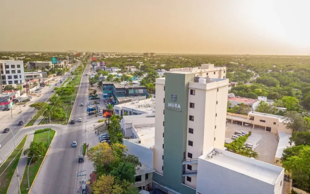 ESDUMA MURá CANCúN