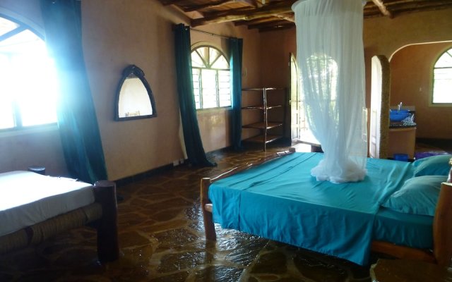 "room in Guest Room - Colobus Suite of 40m2 in Villa 560 m2, View of the Indian Ocean"