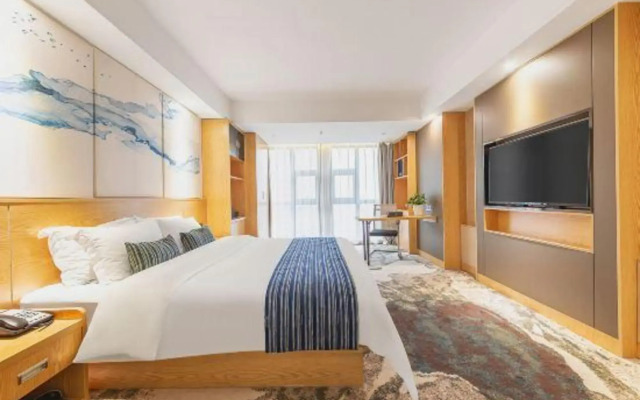 Diqiu Lvbaoshi Hotel