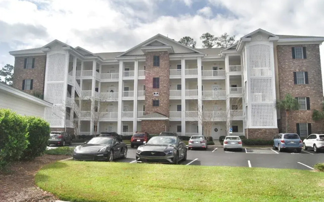 4886 Luster Leaf Circle - Magnolia Pointe 402 by RedAwning