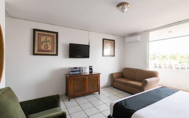 Capital O Zona Dorada Inn